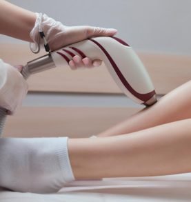 Body treatment using a handheld skincare device